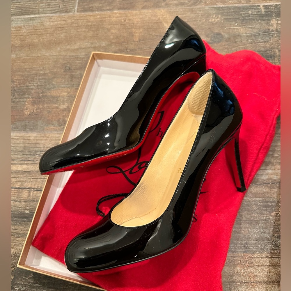 Louboutin heels, worn three times